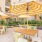 a group of tables and chairs outside