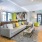a spacious room with a fireplace